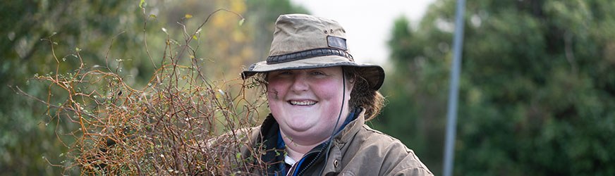 Kelsi Hayes with some of the seedlings from the Waikawa Community Nursery.