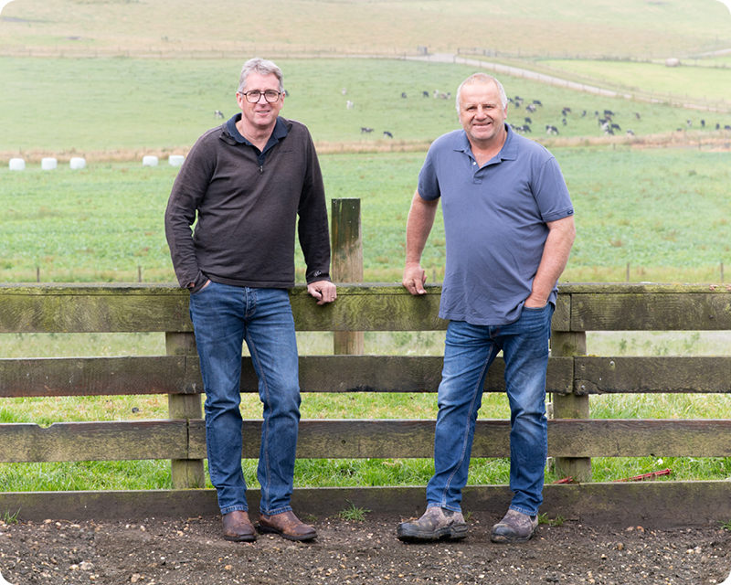 Chair Jeremy McPhail and Councillor Phil Morrison on a farm at Waikaka Valley